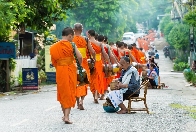 Alms Giving Ceremony and Market with taste of food and dinks