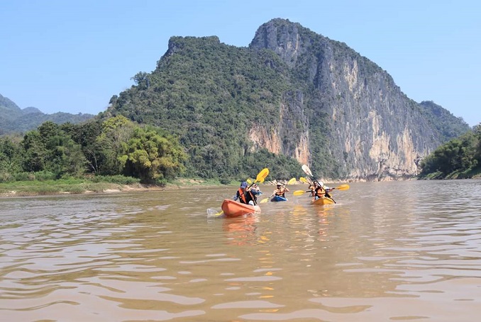 Kayaking to Pak Ou caves, Villages and Kuang Si Falls 1 day tour